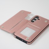 Coque Samsung Galaxy S24+ - Etui en silicone avec surface en similicuir et porte-monnaie pliable - Rose