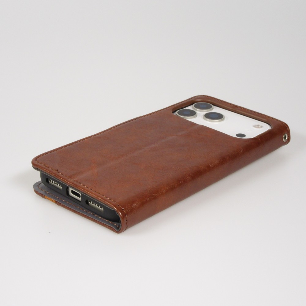Etui cuir iPhone 17 Pro - Flip Wallet en cuir véritable avec stripe design et compartiment à cartes - Brun foncé