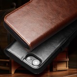 Fourre iPhone 16e - Flip Qialino cuir véritable avec fermeture magnétique - Noir