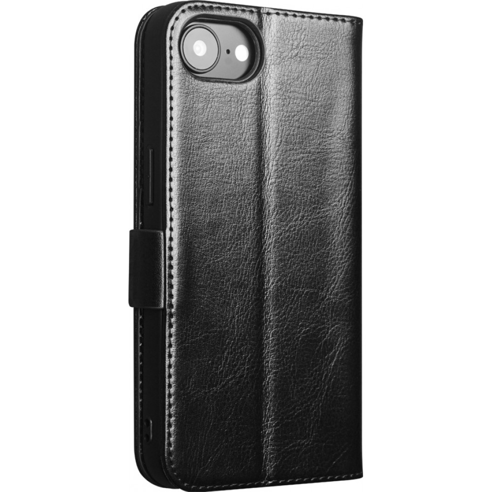 Fourre iPhone 16e - Flip Qialino cuir véritable avec fermeture magnétique - Noir