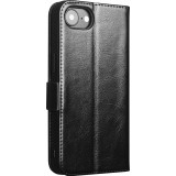 Fourre iPhone 16e - Flip Qialino cuir véritable avec fermeture magnétique - Noir