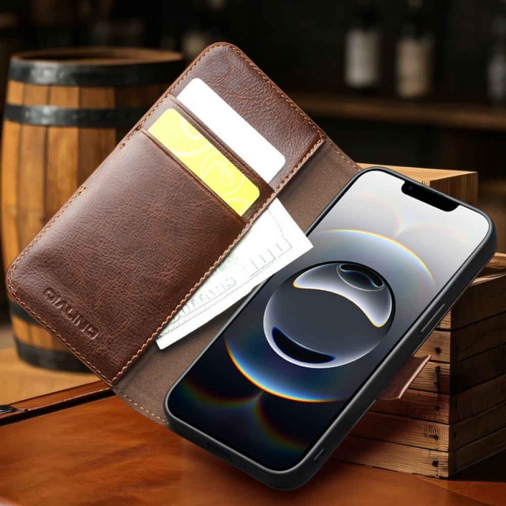 Fourre iPhone 16e - Flip Qialino cuir véritable avec fermeture magnétique - Noir