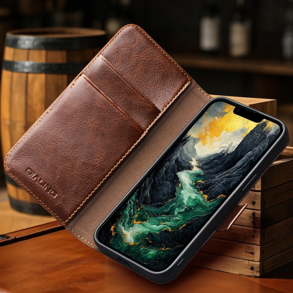 Fourre iPhone 16e - Flip Qialino cuir véritable avec fermeture magnétique - Noir